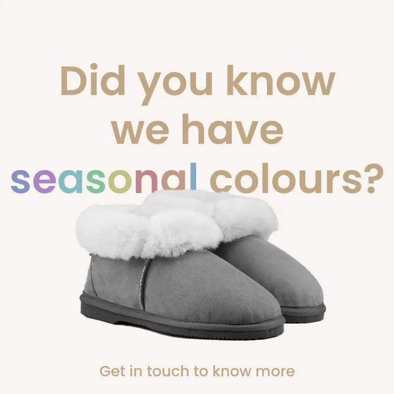 Men's ugg slippers with a suede finish and wool turn, variety of seasonal colours, side view of the pair. #color_seasonal