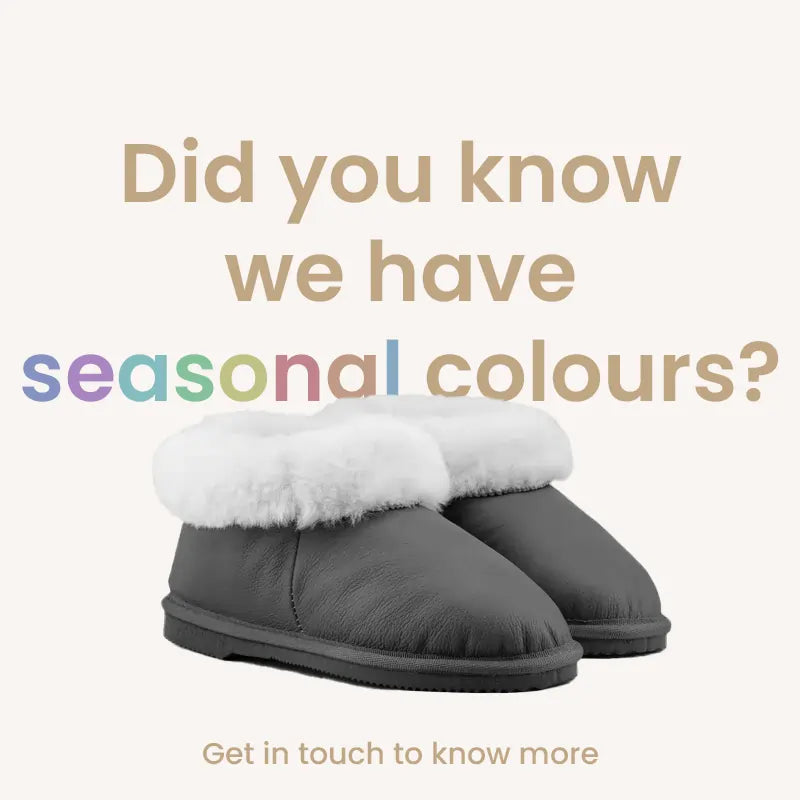 Ugg slippers with a genuine leather finish and wool turn, variety of seasonal colours, side view of the pair. #color_seasonal