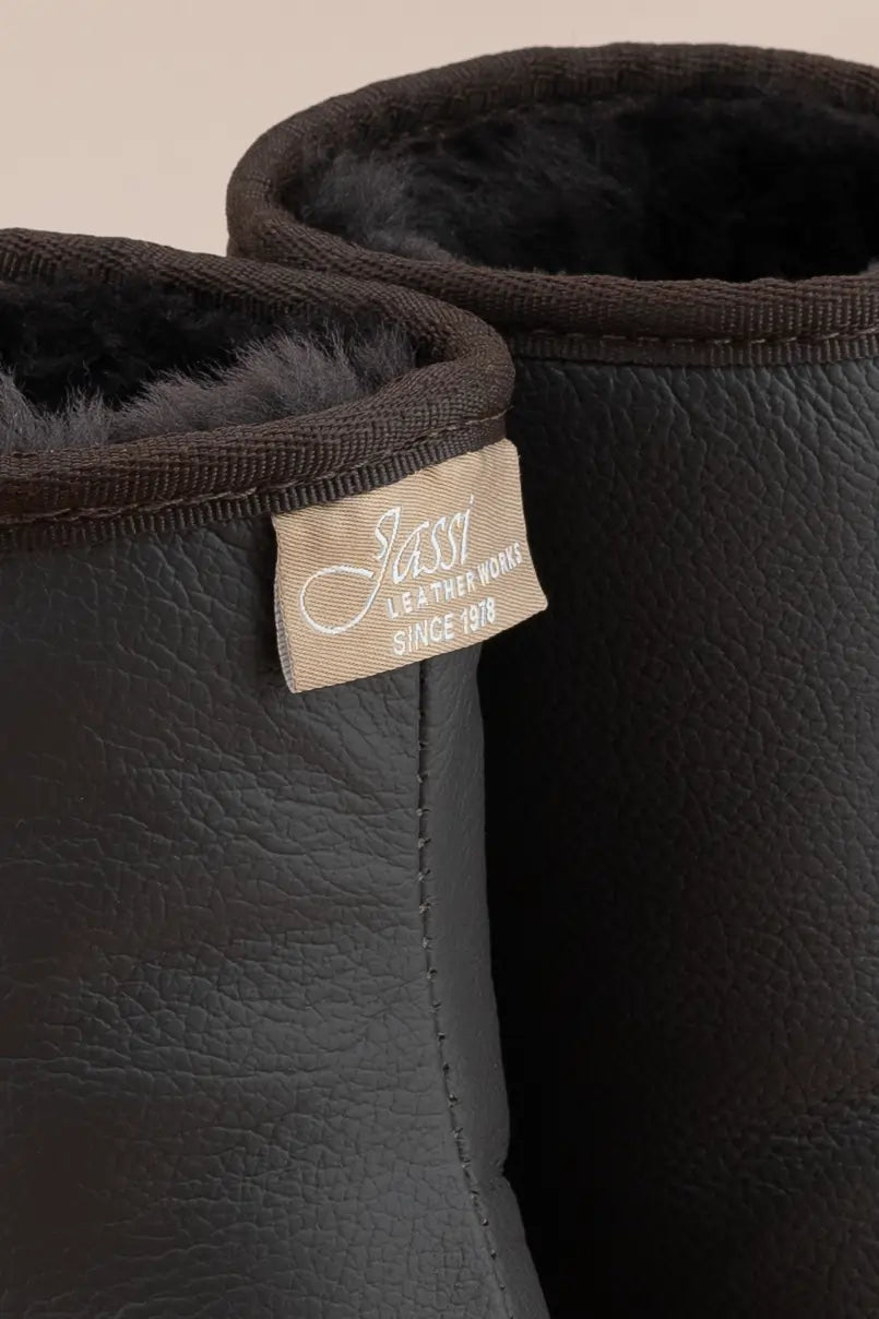 Close up of Jassi label on chocolate leather ugg boots.