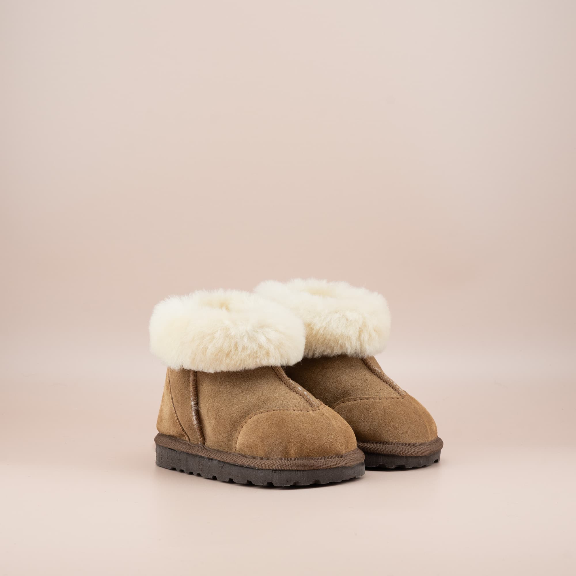 Classic Kid Ugg Boots for Toddler in Suede Tan Sheepskin with wool turn, Front Side View.