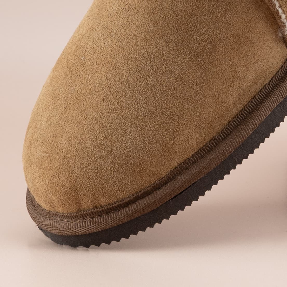 Close up look of a Jassi ugg sole, including EVA and bind.