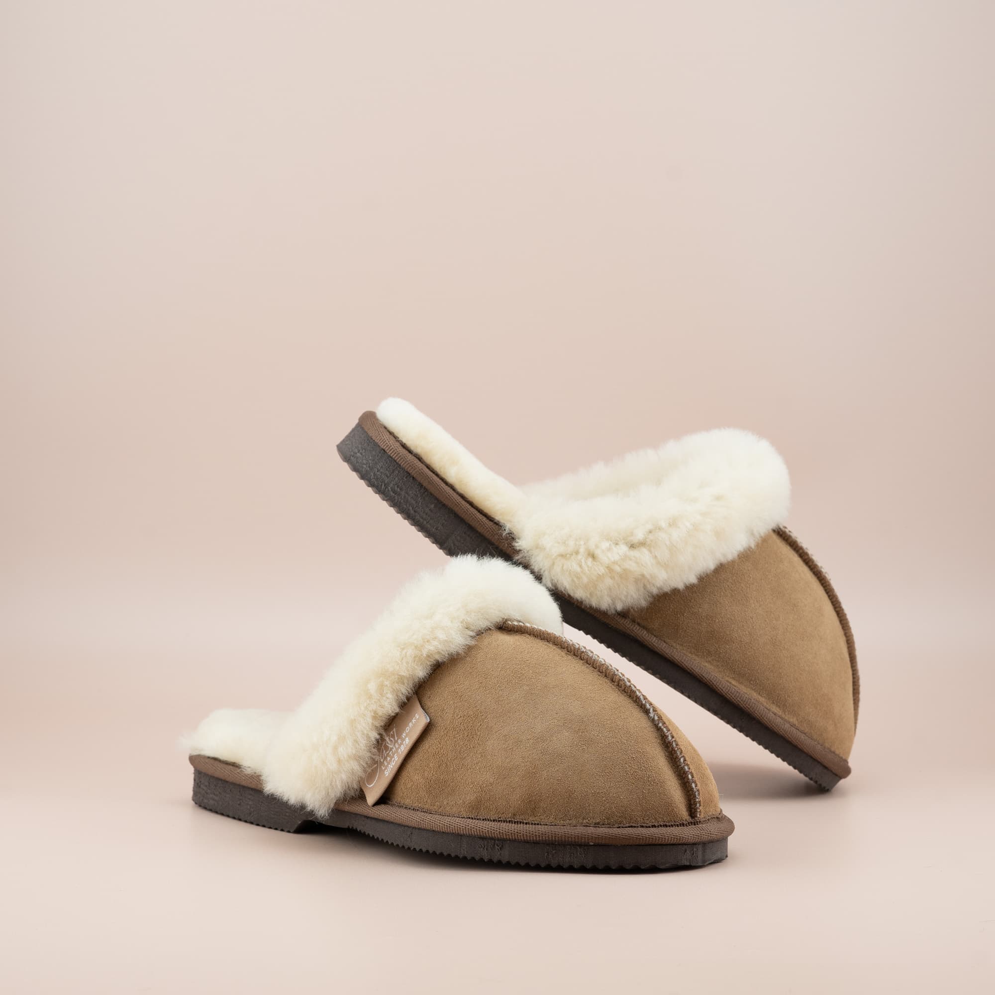 Ugg Scuffs in Tan sheepskin and organic Wool Turn Front and Side view of the pair.