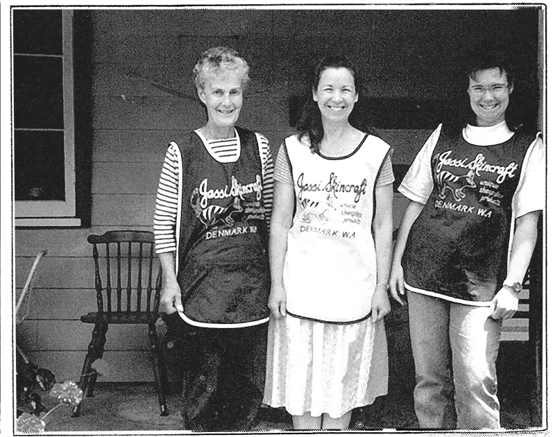 Judy, founder of Jassi, in front of the old ugg boot shop wearing the Jassi old uniform.