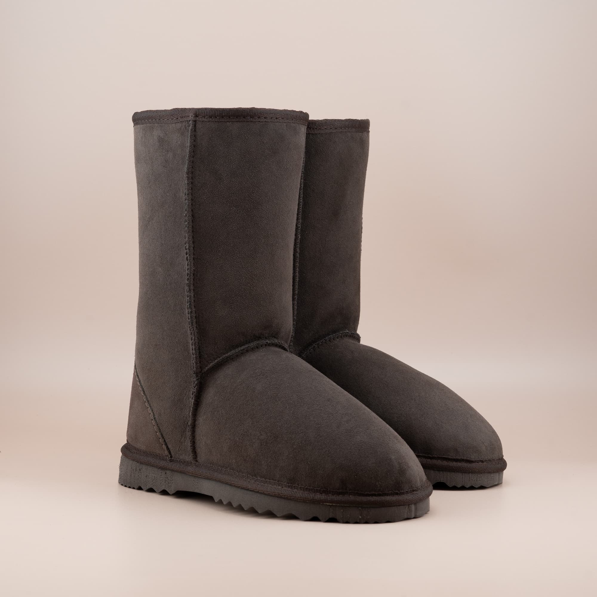 Kid's classic mid ugg boot in suede chocolate color, front side view. #color_chocolate