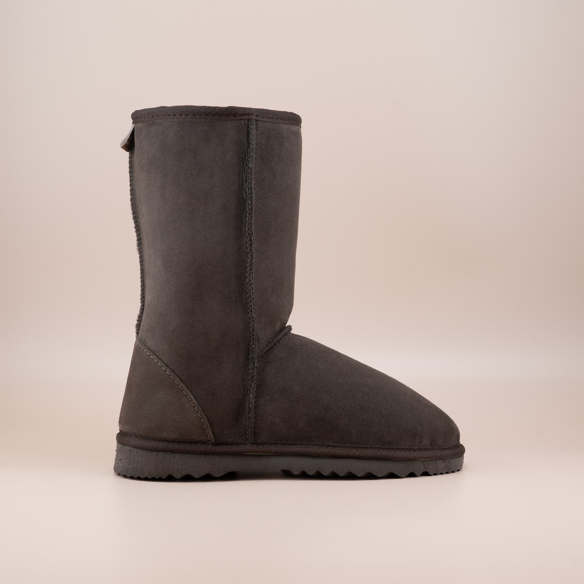 Kid's classic mid ugg boot in suede chocolate color, side view. #color_chocolate