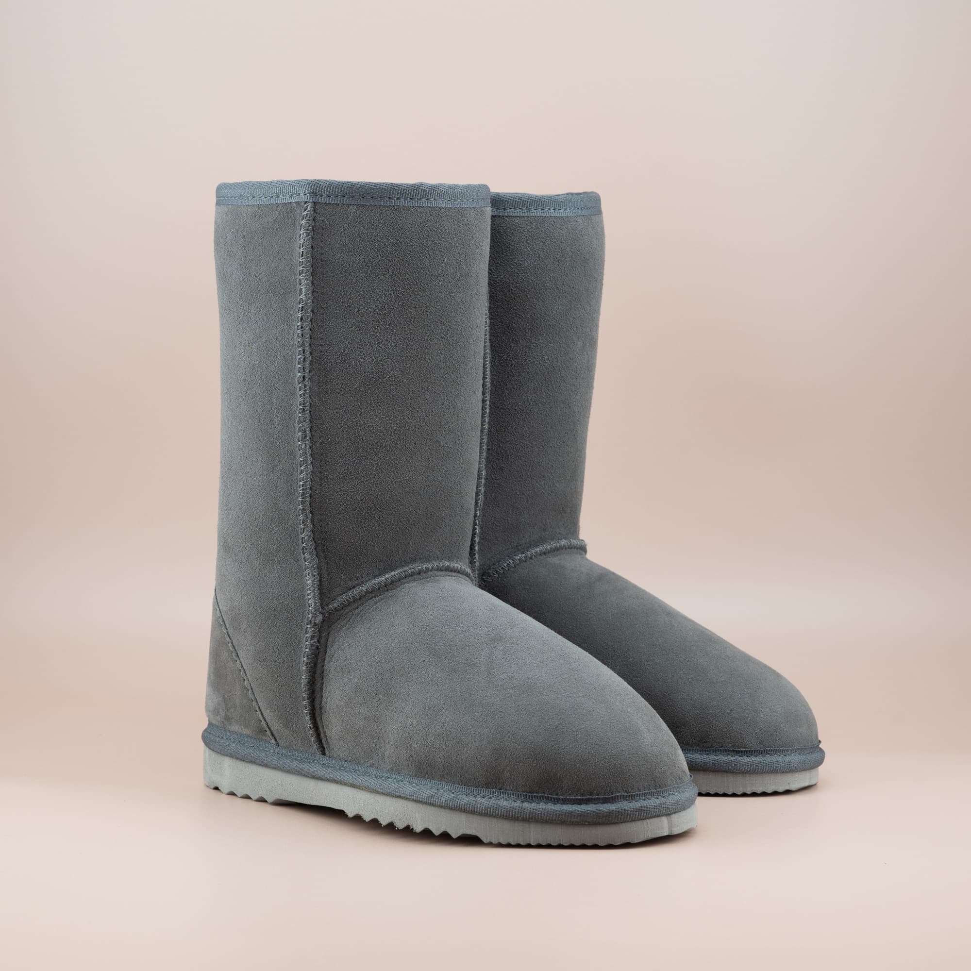 Kid's classic mid ugg boot in suede grey color, front side view. #color_grey