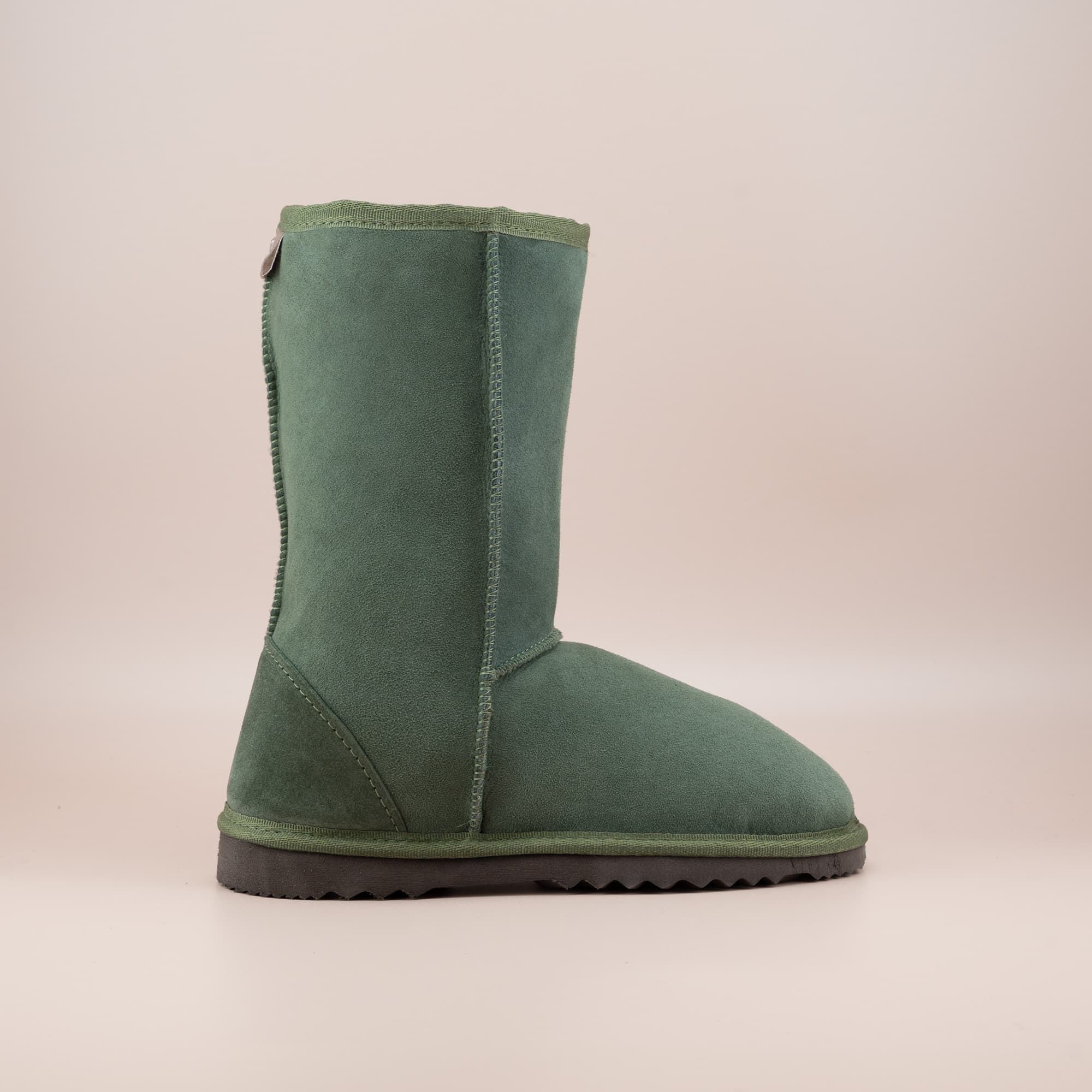 Kid's classic mid ugg boot in suede olive color, side view. #color_olive