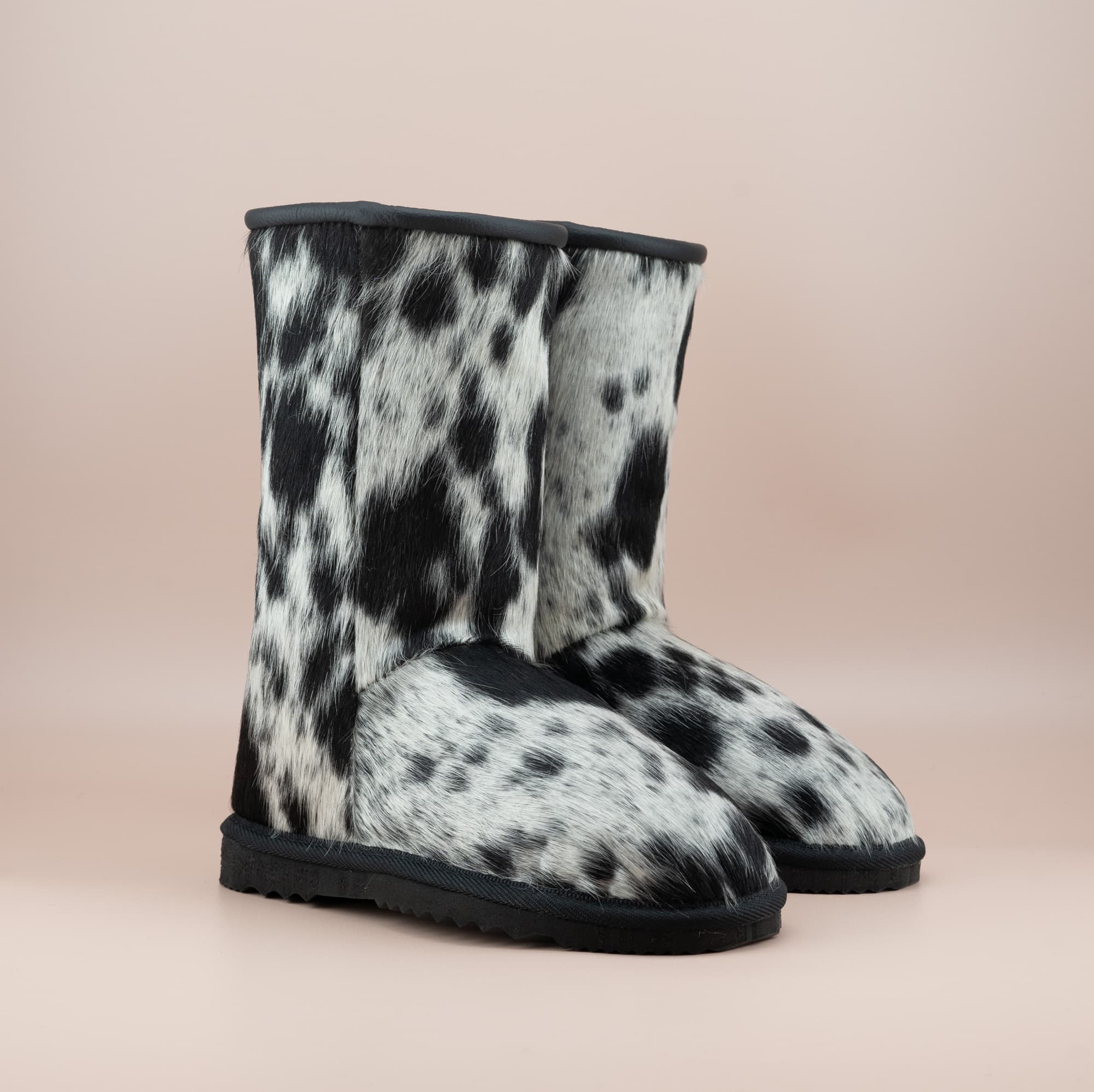 Men's Special Edition mid ugg boots in genuine unique cowhide finish, front side view.