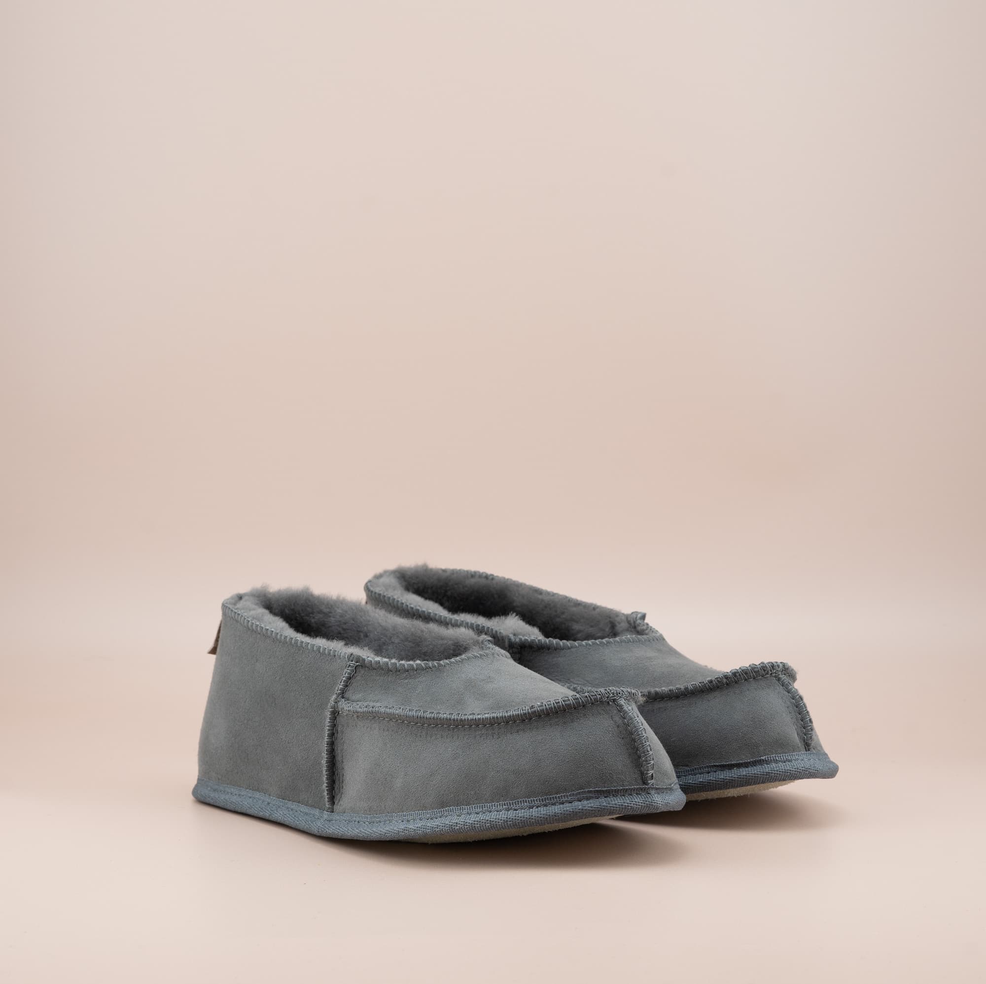 Men's ugg moccasins with a suede finish in grey, side view. #color_grey