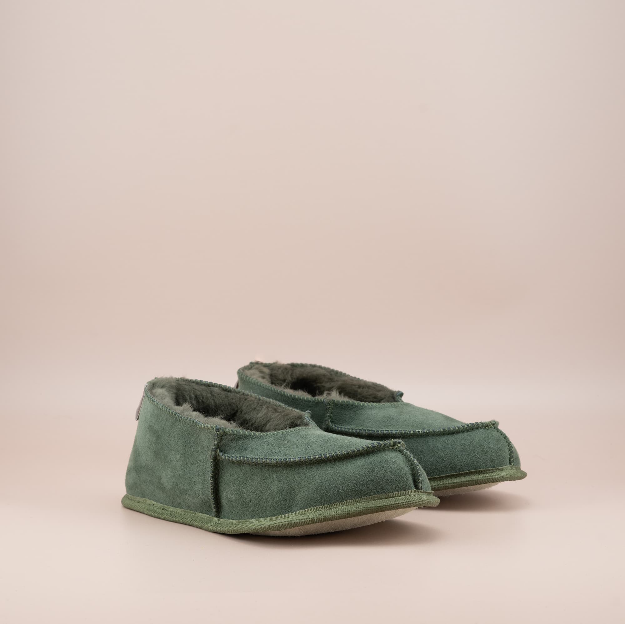 Men's ugg moccasins with a suede finish in olive, side view. #color_olive