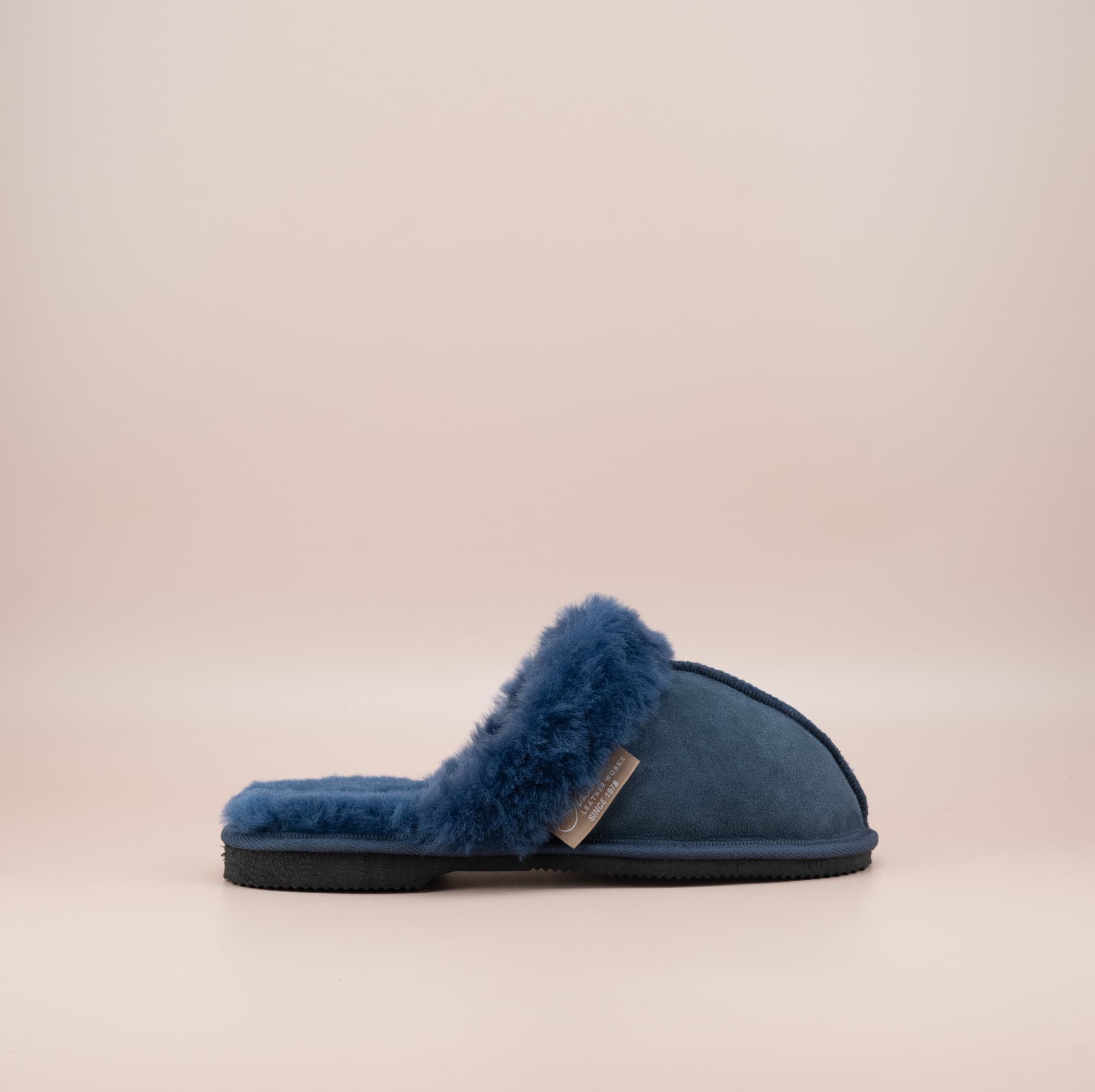 Men's ugg scuffs with a suede finish in navy and wool turn, single outer side view. #color_navy