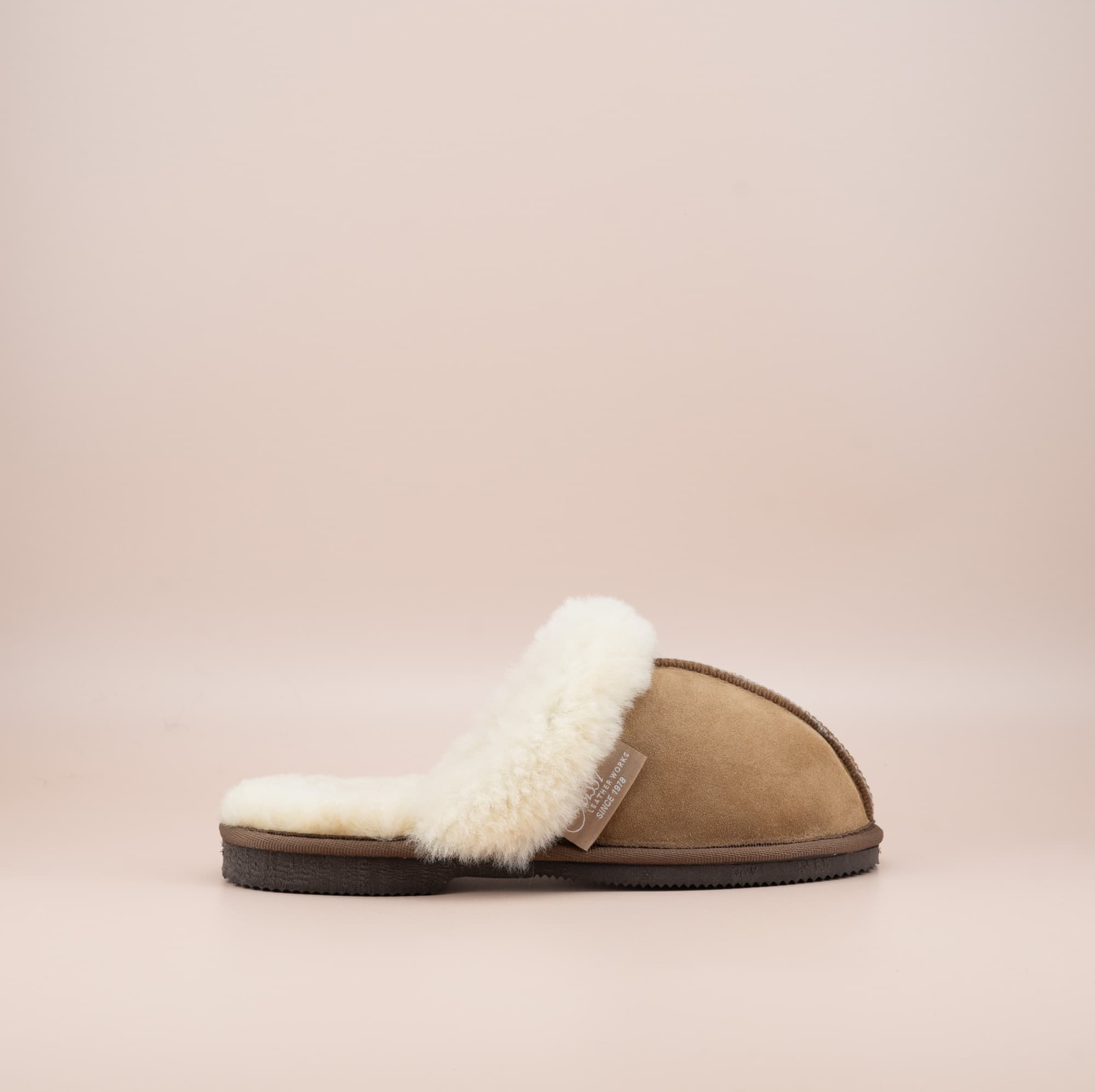 Men's ugg scuffs with a suede finish in tan and wool turn, single outer side view. #color_tan