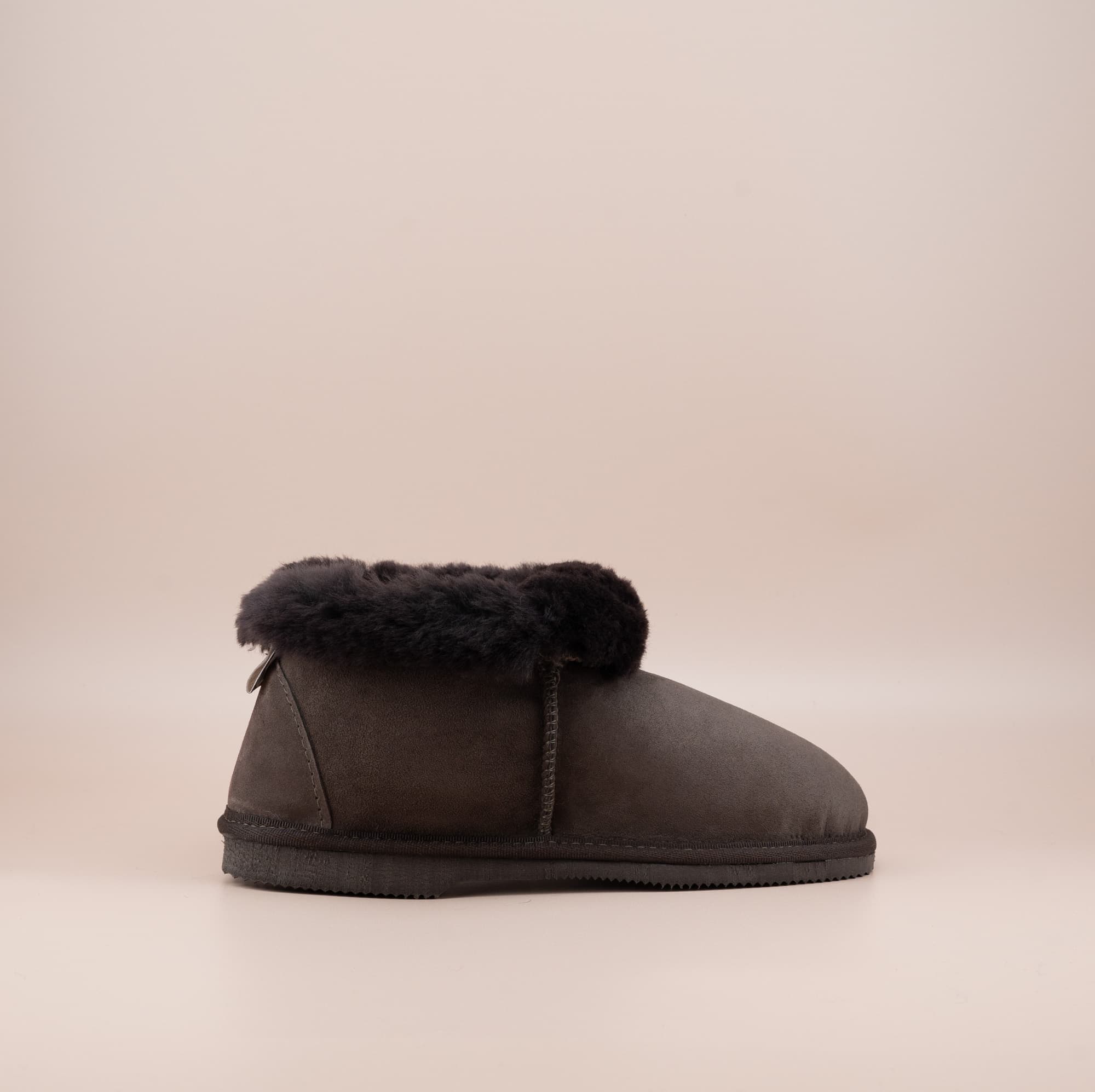 Men's ugg slippers with a suede finish in chocolate and wool turn, single side view. #color_chocolate