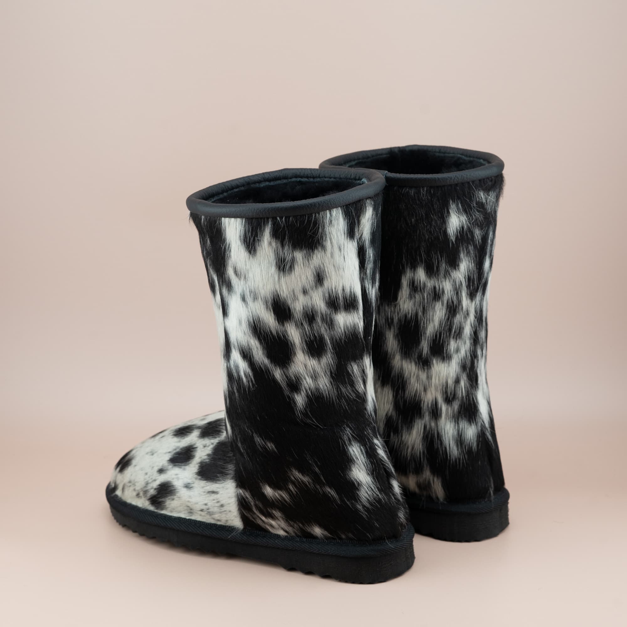 Women's Special Edition cowhide mid ugg boots, back view.