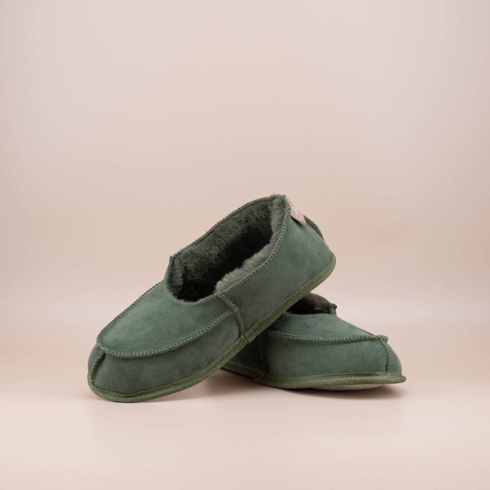 Women's ugg moccasins in olive suede, front and side view of the pair. #color_olive