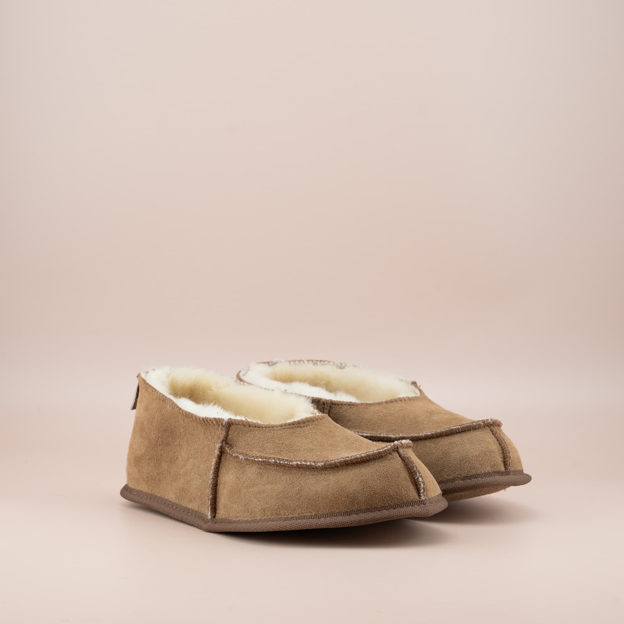 Women's ugg moccasins in tan suede, side view of the pair. #color_tan