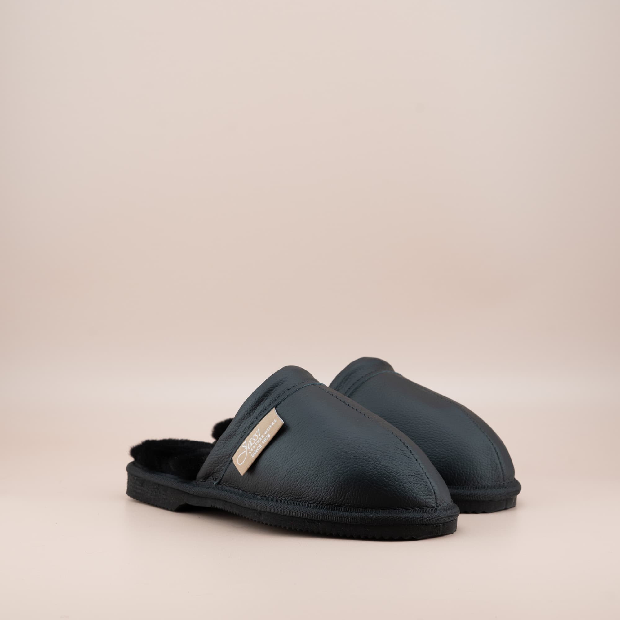 Women's ugg scuffs in black leather, side view of the pair. #color_leather black