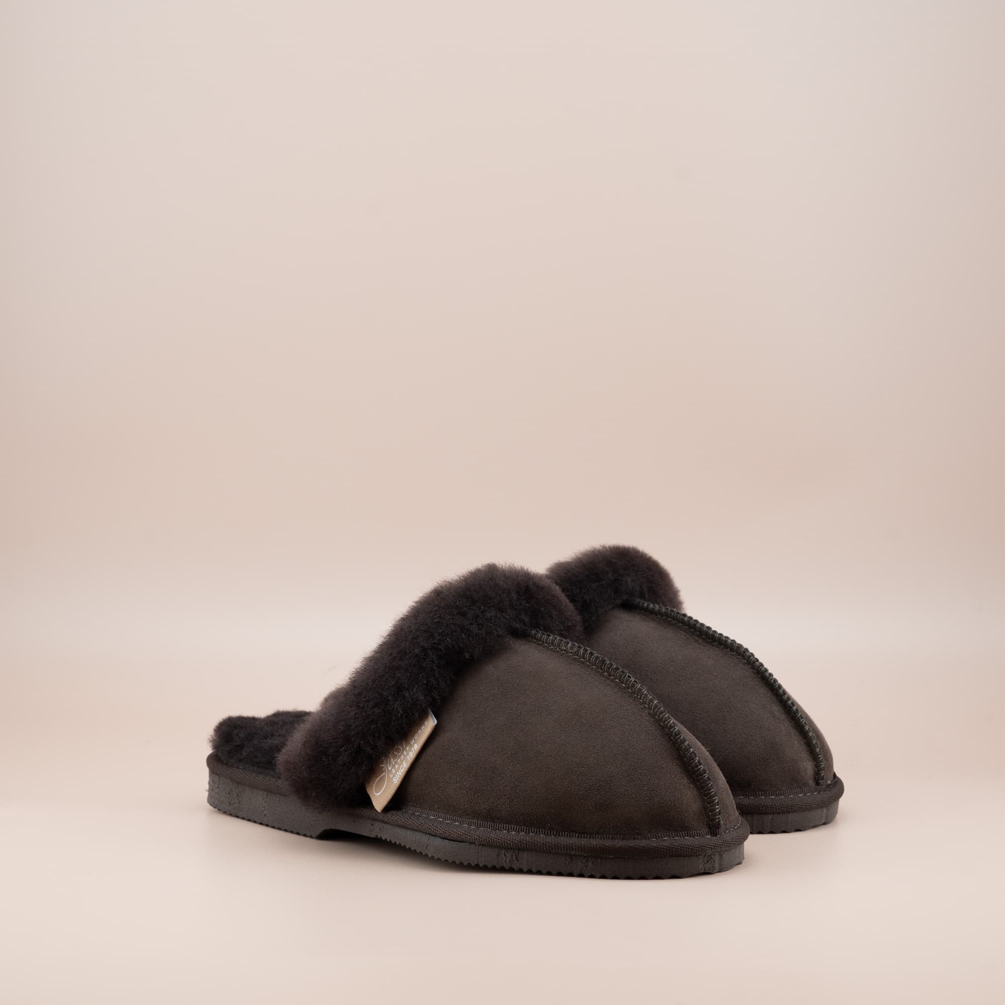 Women's ugg scuffs in chocolate suede and soft merino wool turn, side view of the pair. #color_chocolate