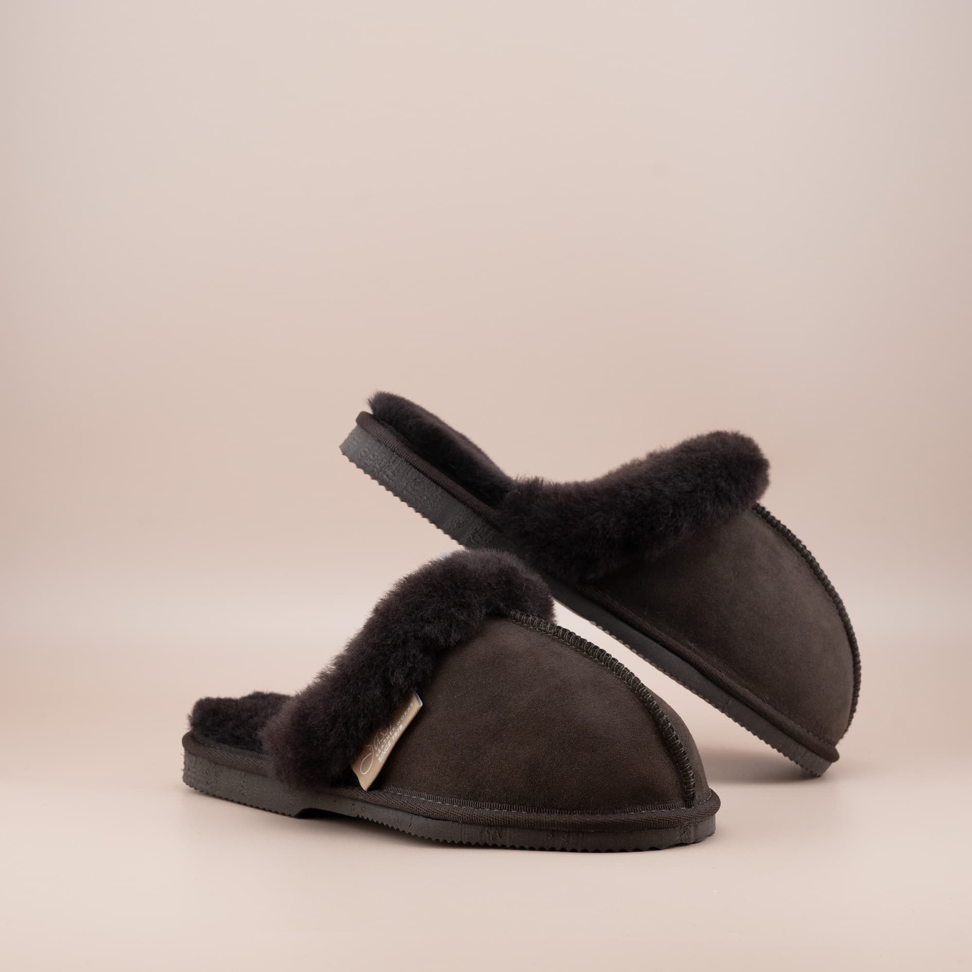 Women's ugg scuffs in chocolate suede and soft merino wool turn,front and side view of the pair. #color_chocolate