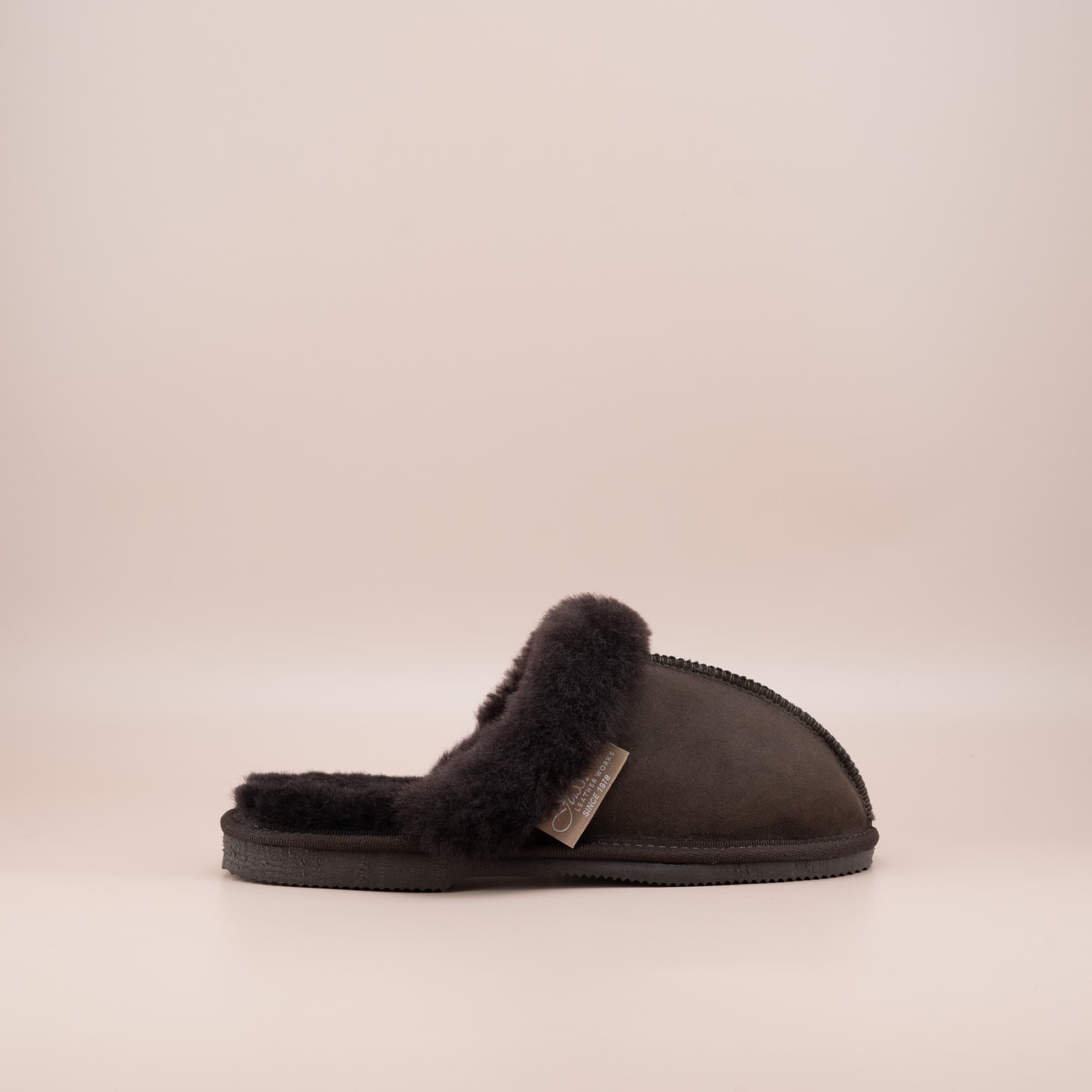 Women's ugg scuffs in chocolate suede and soft merino wool turn, single side view. #color_chocolate